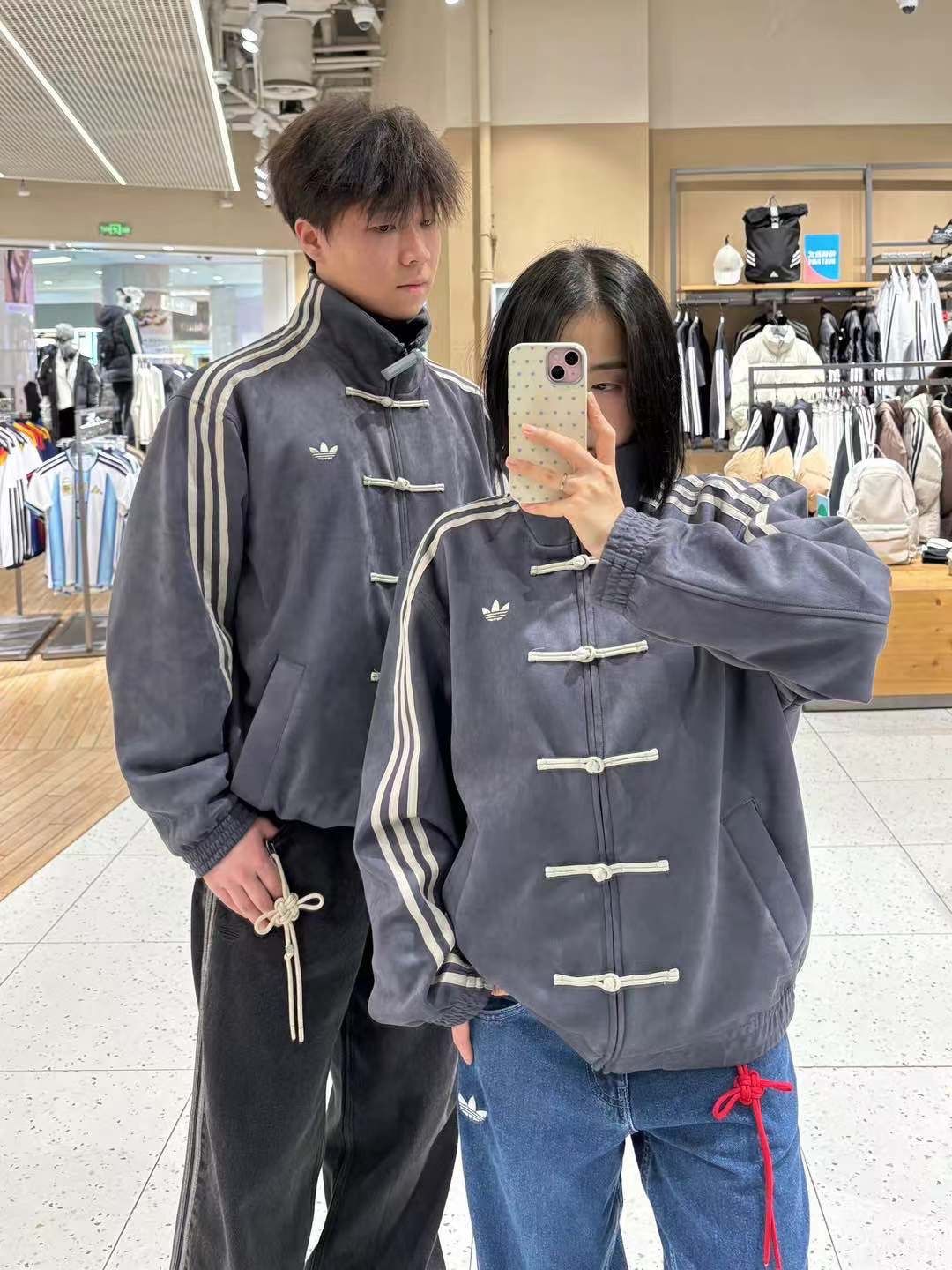 Model wearing urban clothing, styling the oversized ash grey lunar new year outfit