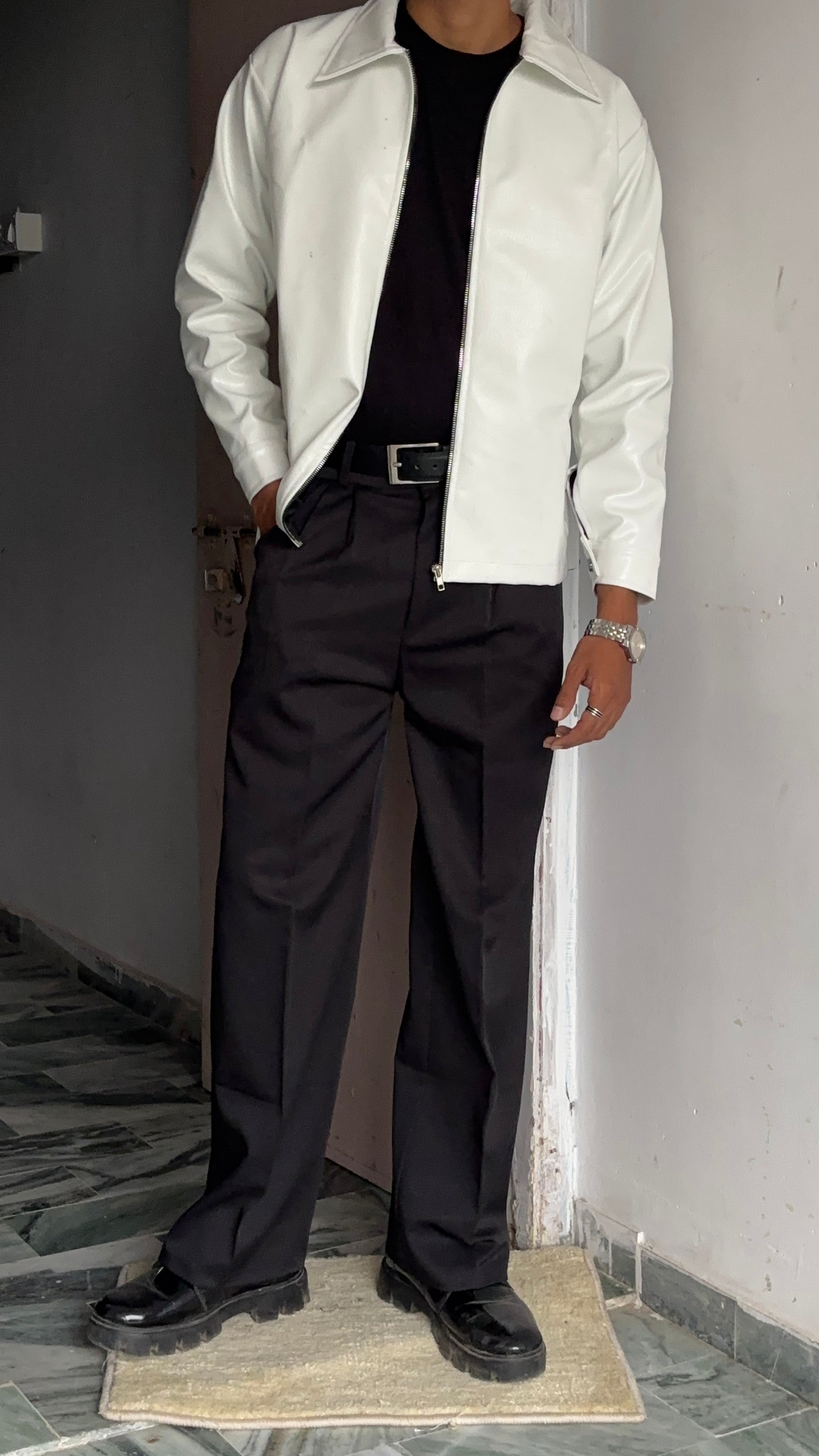 Model styling a White vegan leather jacket black, showing the perfect oversized faux black leather jacket mens/womens fit