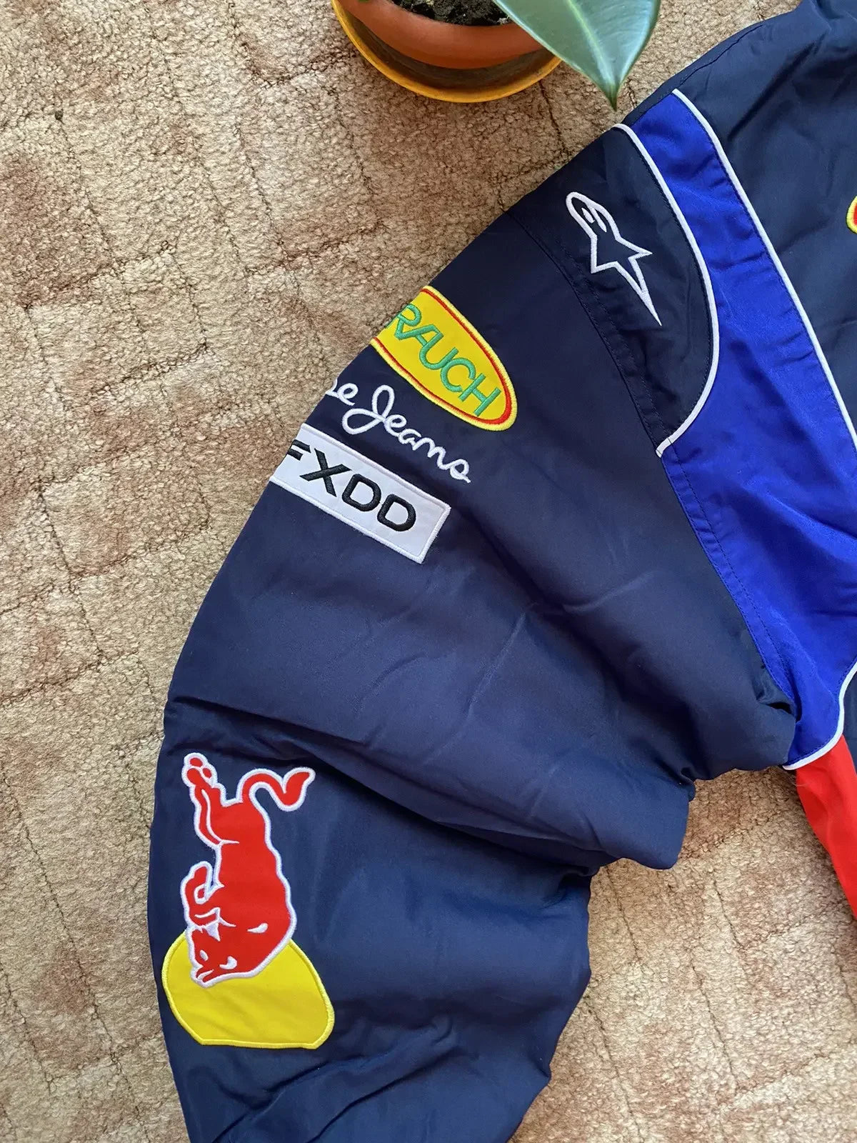 Retro racing windbreaker sleeve with direct embroidery sponsor patches and bold logos
