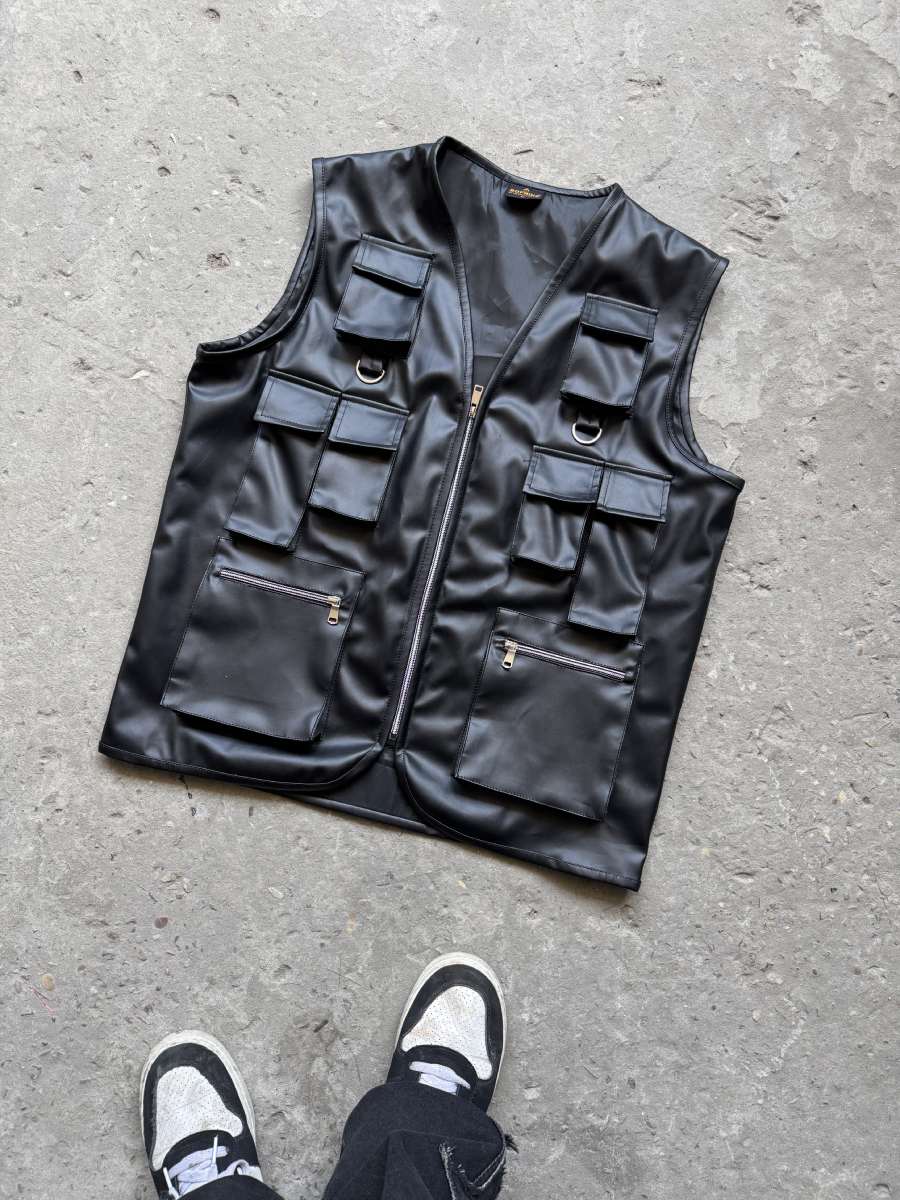 Front layout of the Banstore black utility vest, a heavy-duty black faux leather utility vest for streetwear