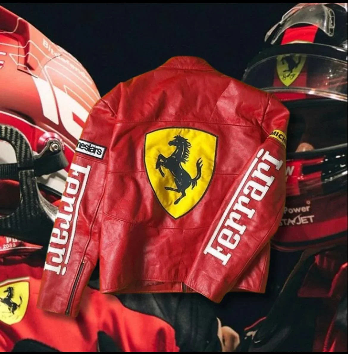 Red motorsport leather jacket with racing patches, bold Ferrari logo, and zipper details.