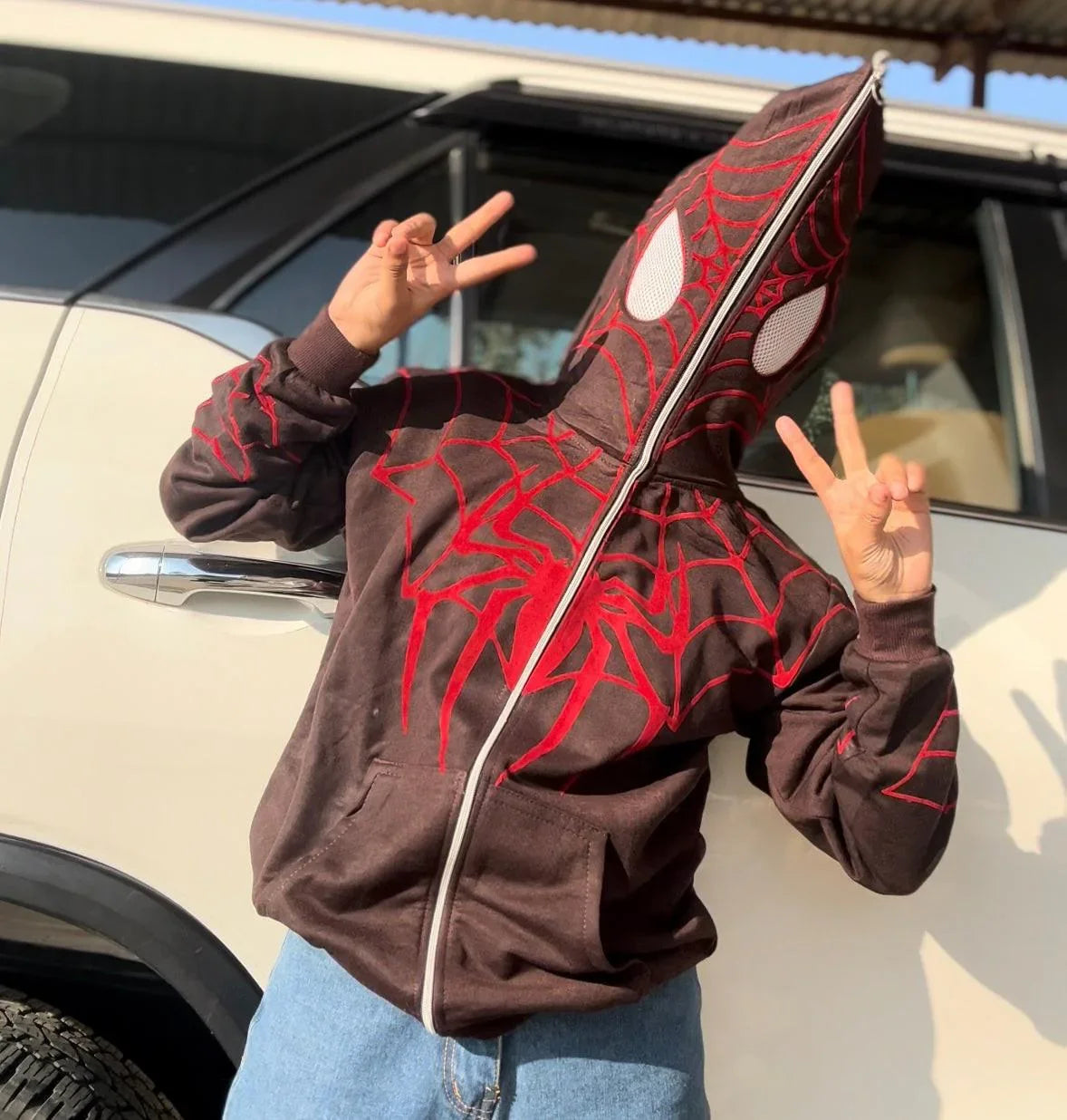 Full zip brown hoodie with red web design and mask hood, inspired by SpiderMan, streetwear fashion