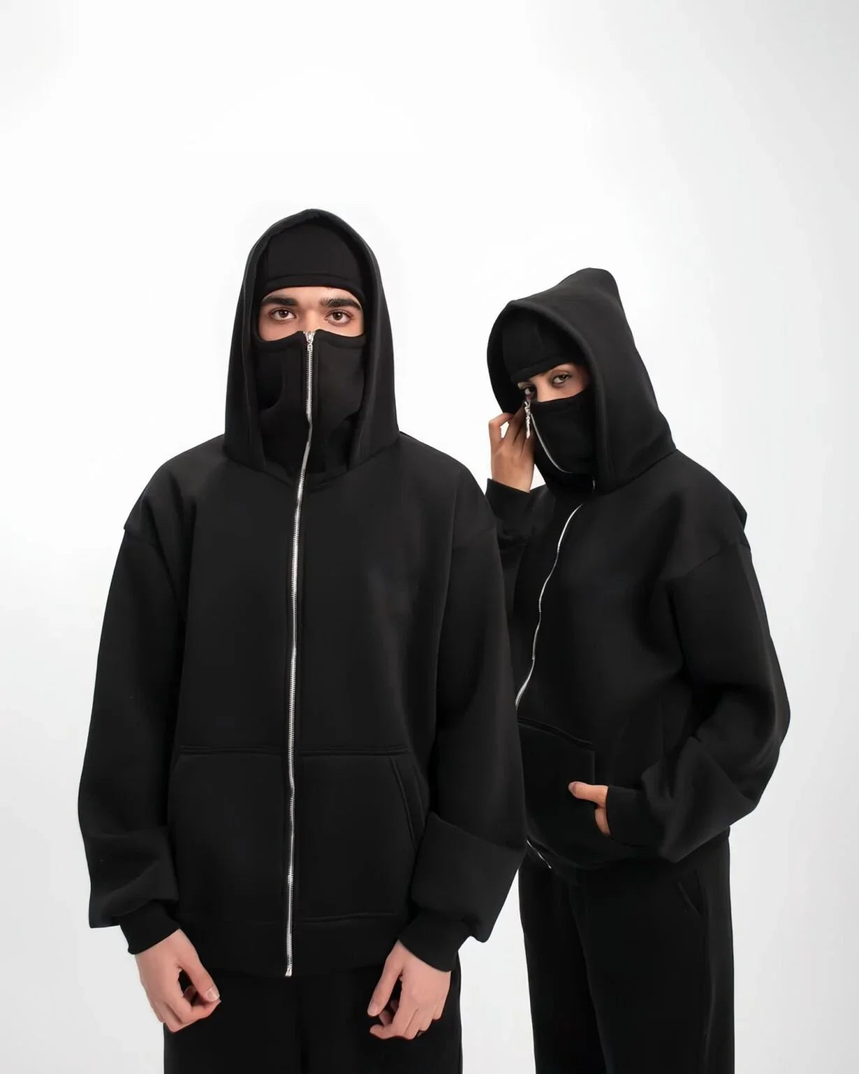 Banstore Void Duo pack of 2 black balaclava hoodies in high-density 450GSM obsidian fleece.